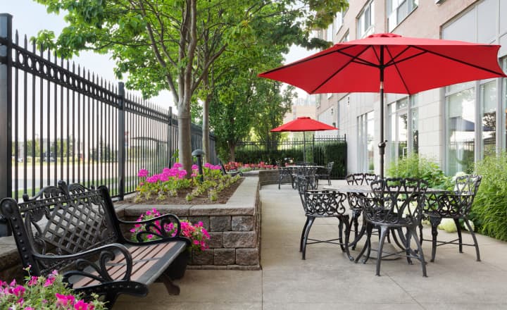 ErinMills-home-outdoor_patio_area_with_benches_and_tables ErinMills-home-outdoor_patio_area_with_benches_and_tables